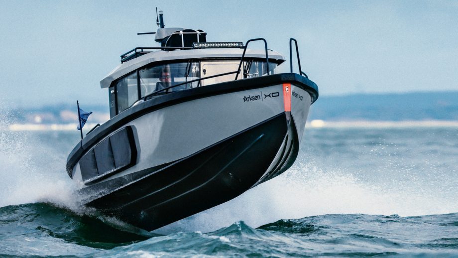 The Arksen 30 Adventure leaping off a wave